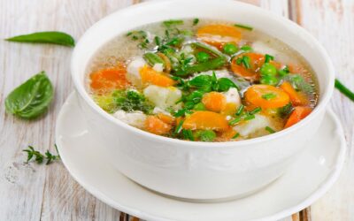Minestrone with flakes of cheese